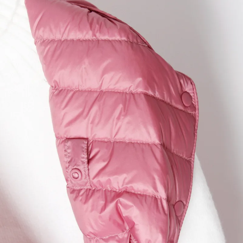 سترة نسائية لخريف وشتاء 2025 خفيفة للغاية بيضاء مبطنة للأسفل سترة نسائية طويلة أسفل صدرية معطف بدون أكمام ملابس خارجية سترات