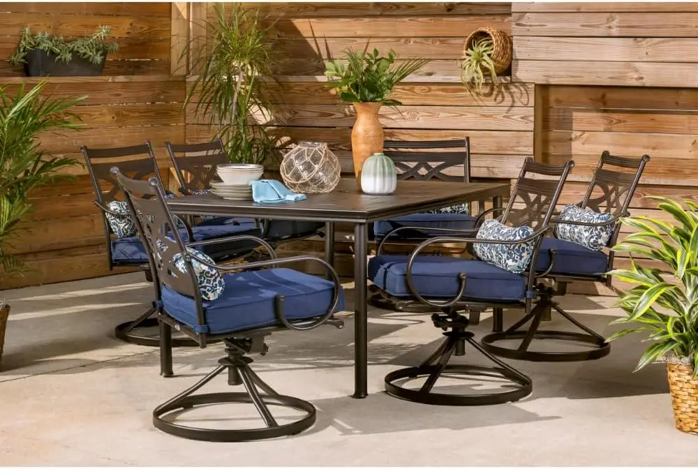 Hanover Montclair 7-Piece Outdoor Dining Set With 6 Swivel Rockers, Navy Blue Cushions And Stamped Steel Rectangular Dining