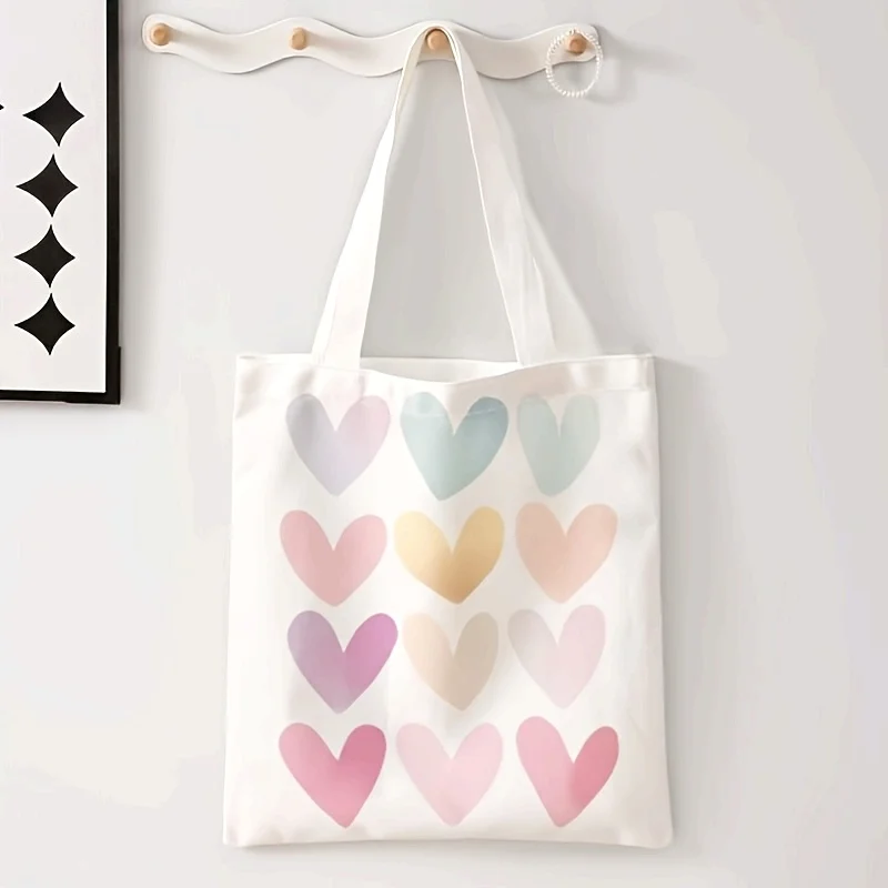 Stylish Cartoon Heart Pattern Tote Bag, a Reusable Shoulder Shopping Bag, a Versatile Handbag, and a Casual Backpack.