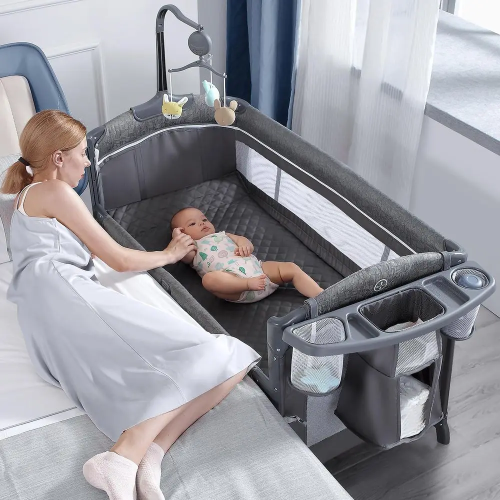

Portable Playard with Bassinet, Changing Table, and Music Mobile for Newborns to Toddlers