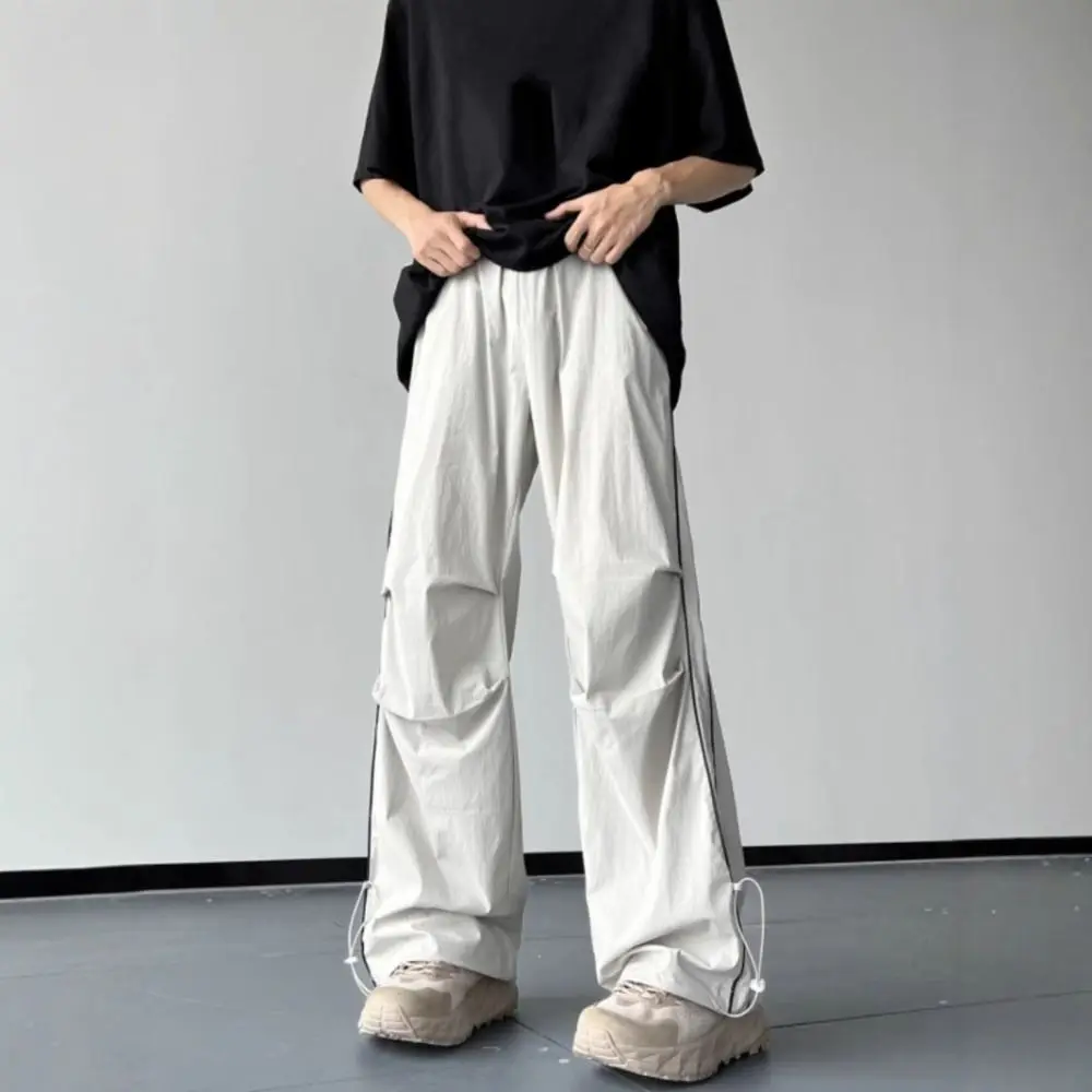 Ins نمط الرباط واسعة الساق Sweatpants شريط فضفاض فضفاض البضائع السراويل Y2K المتضخم الذكور ركض بنطلون الشارع الشهير