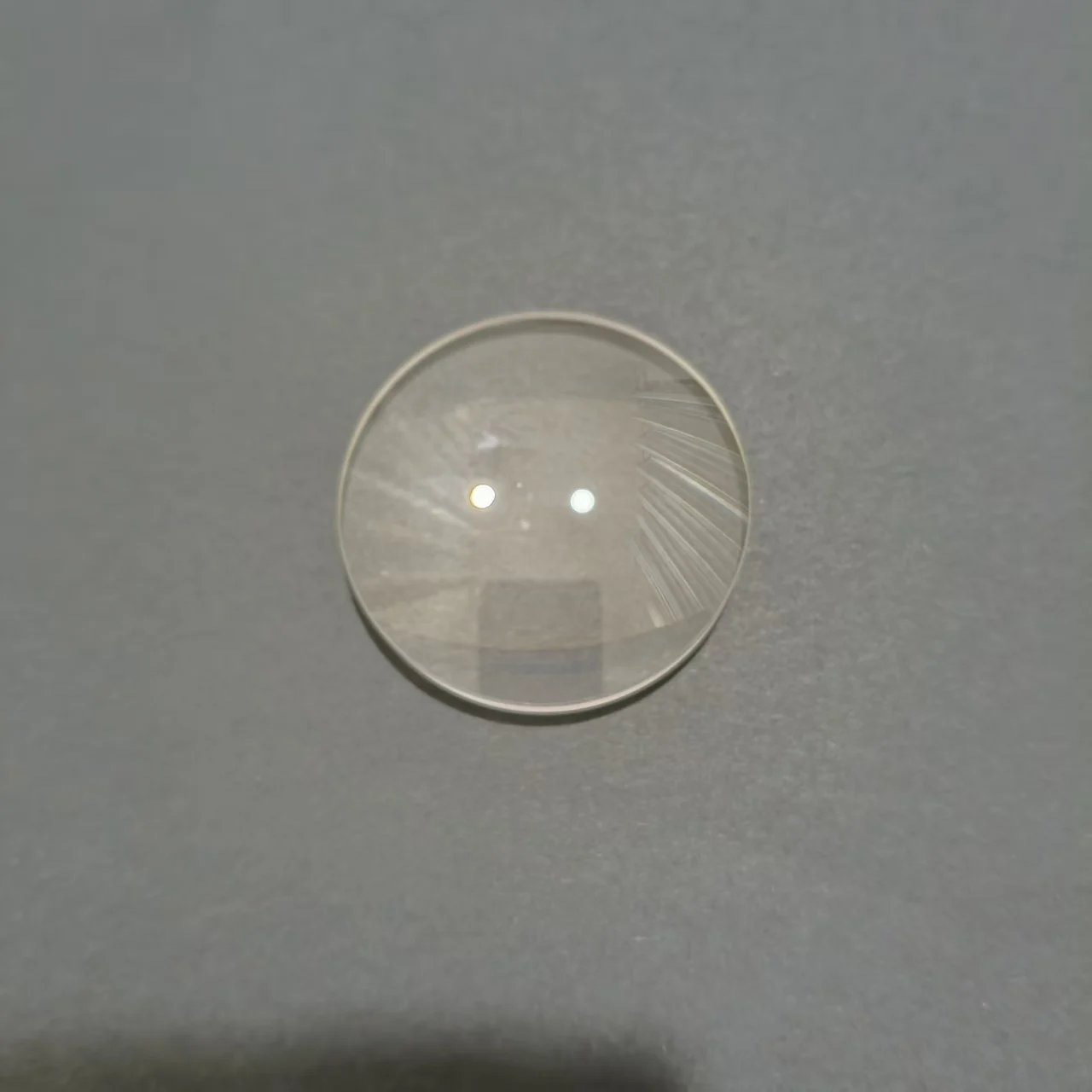 

Diameter 27mm, focal length 136mm concave convex single piece optical glass lens coated with 400~700nm part number R138