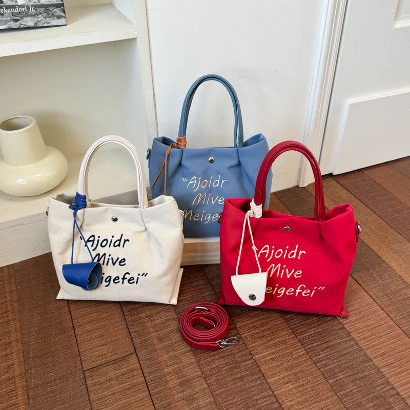 Stylish and simple letter embroidery handbag bag bag Korean casual messenger bag canvas bag women