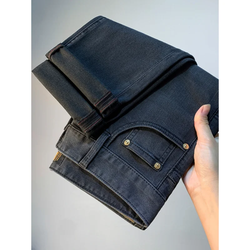 กางเกงยีนส์สีดำทรงตรงเล็ก สไตล์หรูหรา ระดับไฮเอนด์ สำหรับผู้ชาย รุ่นใหม่ล่าสุดประจำฤดูใบไม้ร่วงปี 2025 ทรงเข้ารูป สวมใส่ได้หลากหลาย สไตล์ลำลอง ความยาว 9 ส่วน