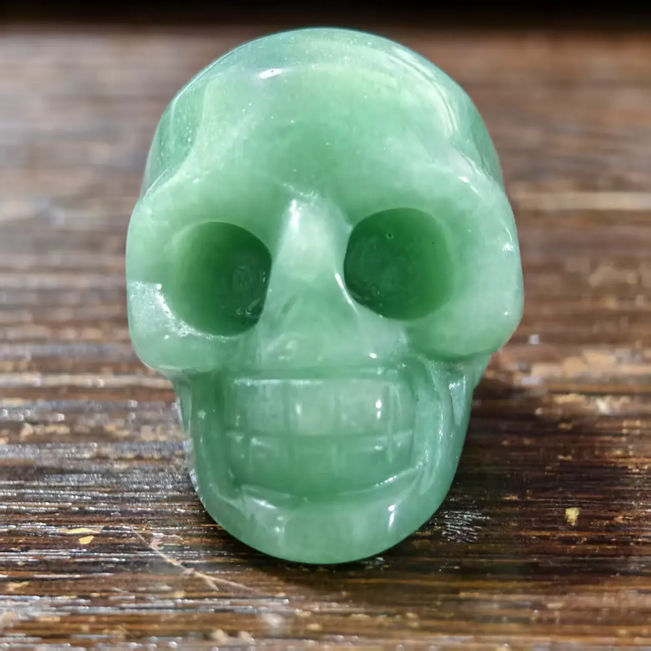 

Natural Dongling Jade Quartzite Skull, hand-polished and ground, with spiritual healing properties. Suitable for home decoration
