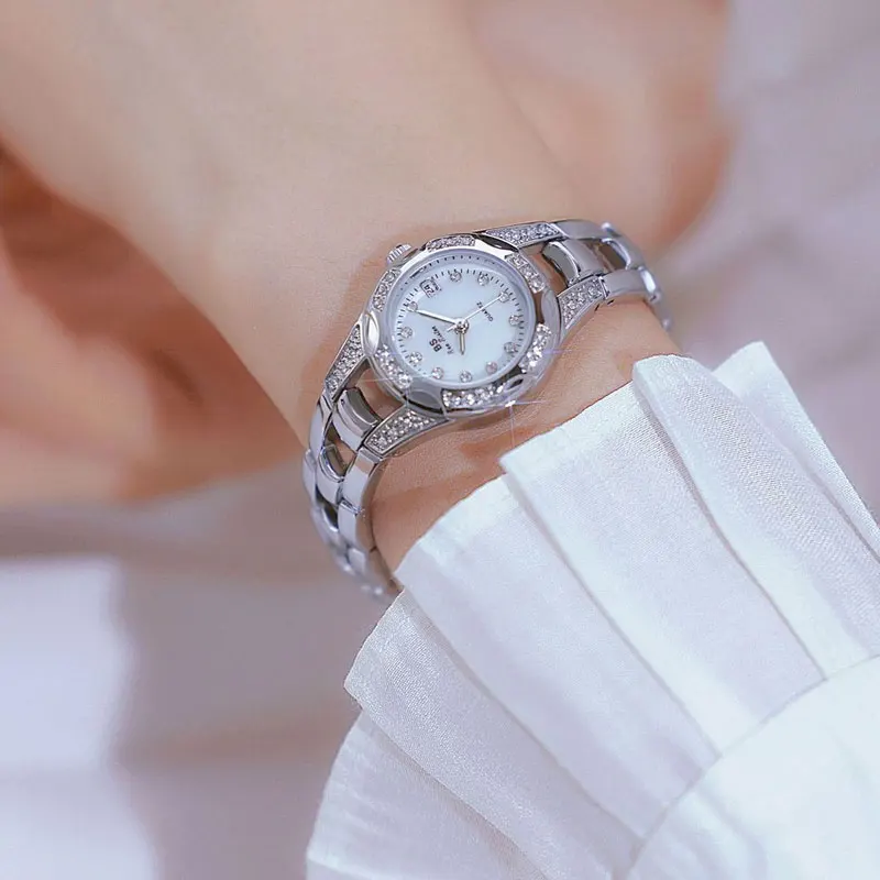 Korean Hollow Silver Bracelet Women's Watch Quartz Pointer Calendar Steel Strip Women's Watch Suitable for New Year Gift Box