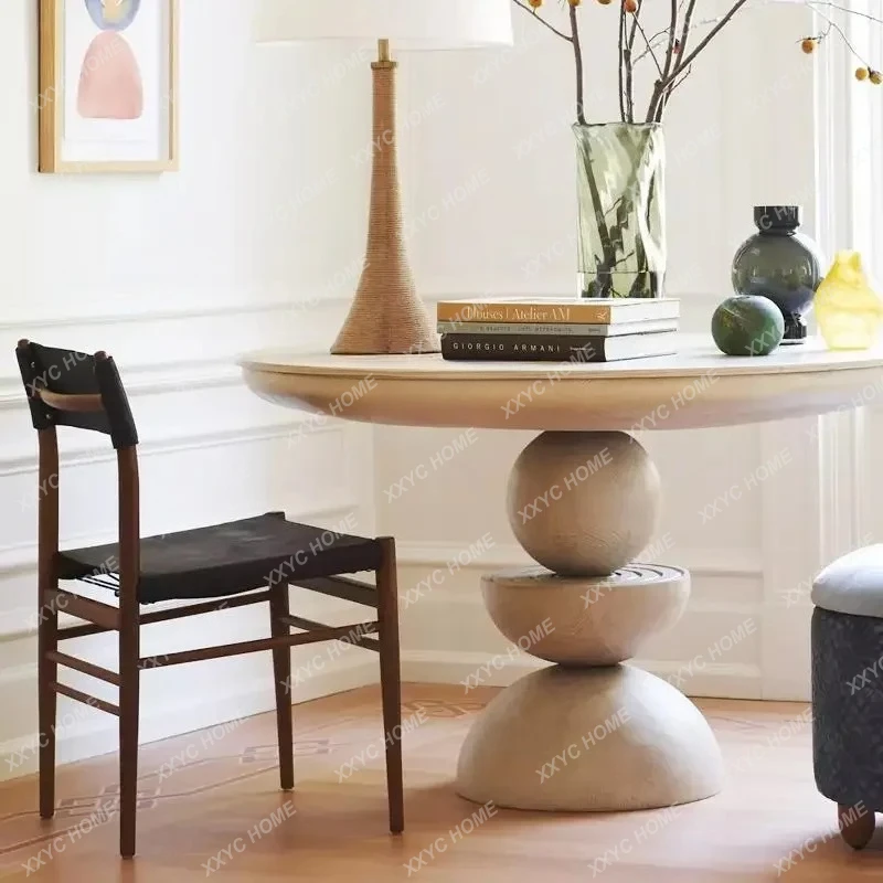 A  wood dining table, retro ivory white dining table, round black, modern simple hotel clubhouse negotiation table