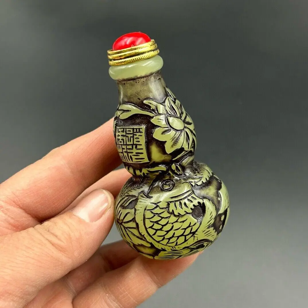 

A luminous snuff bottle beautifully carved by hand in ancient China