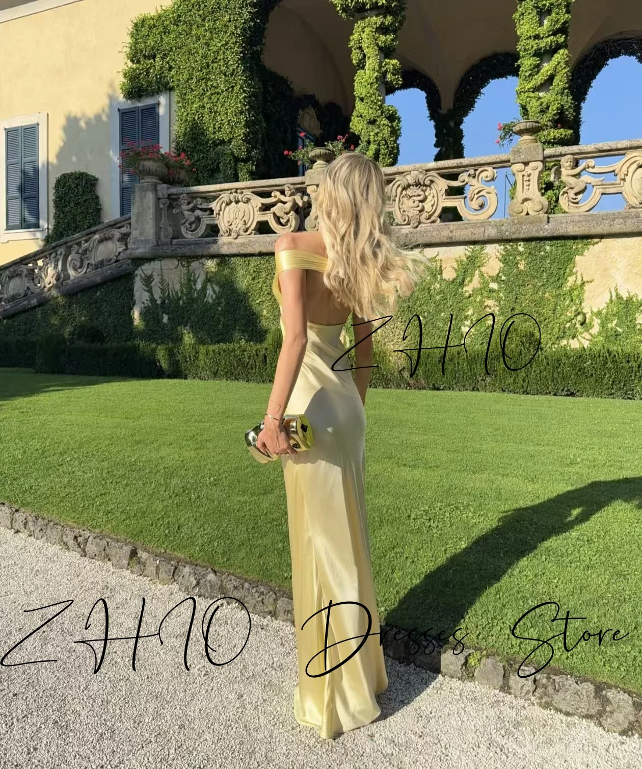 ชุดราตรีงานแต่งงานสีเหลืองหรูหรา ทรงเมอร์เมด คอวี โชว์หลัง ผ้าซาติน ยาวกรอมพื้น สำหรับงานเลี้ยงหรืองานพิธีการ  สามารถสั่งตัดได้