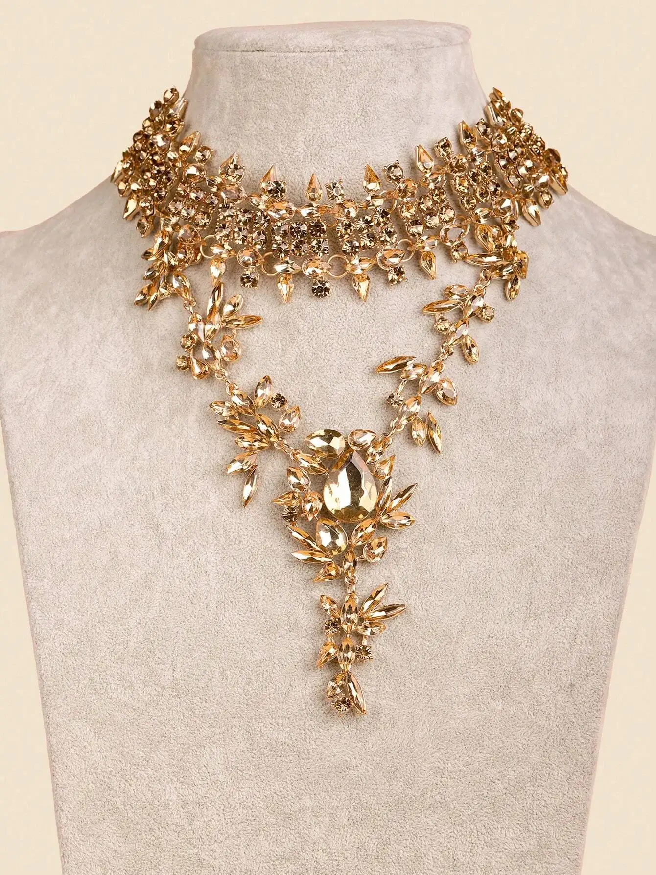

Gold-Tone Multi-Layer Crystal Statement Necklace with Floral Motif