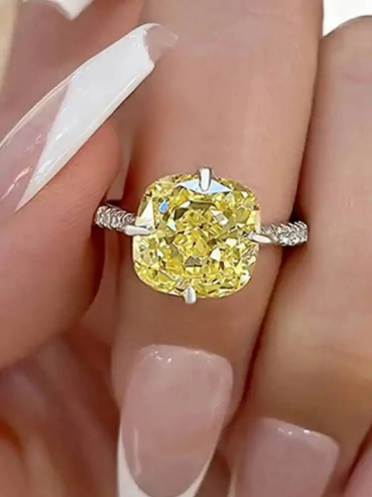 Huitan Ring in einfacher Ausführung, silberfarben, für Damen, mit leuchtend gelbem Zirkonia, vielseitiges Party-Accessoire, trendiger Schmuck