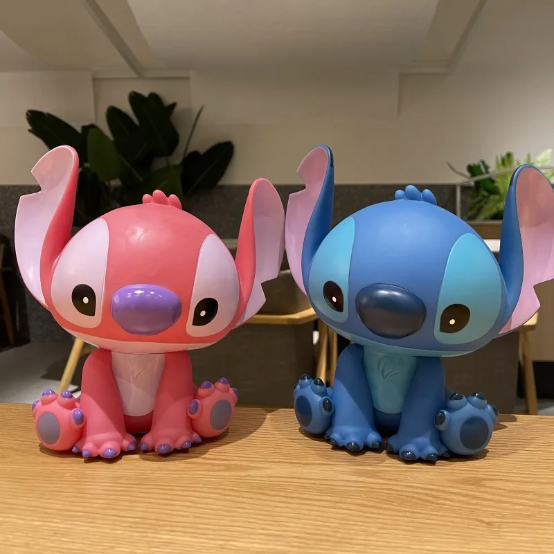 

Disney Stitch Angel Piggy Bank Cartoon Anime Money Box Pvc Action Model Kawaii Doll Decorative Collect Kids Toy Holiday Gift