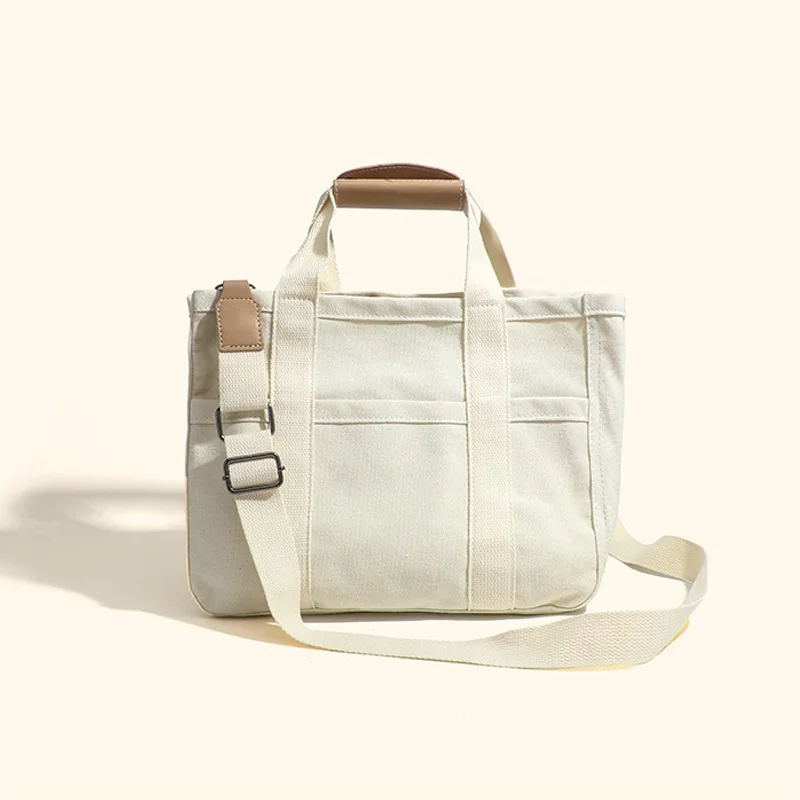 

2024 Korean ins wind mummy bag fashion multi-functional mother and baby go out shoulder slung portable canvas mother bag