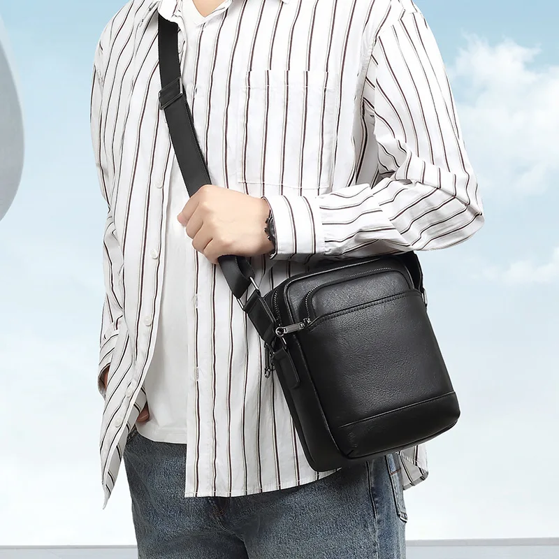 

Real leather cross-body bag for men. Large capacity, multiple pockets. Vertical square premium travel shoulder bag