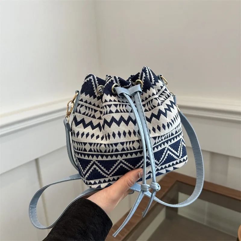 

Ретро-модная сумка-ведро с завязками, женская сумка через плечо, весенне-летняя сумка на одно плечо, универсальная, стильная и шикарная.