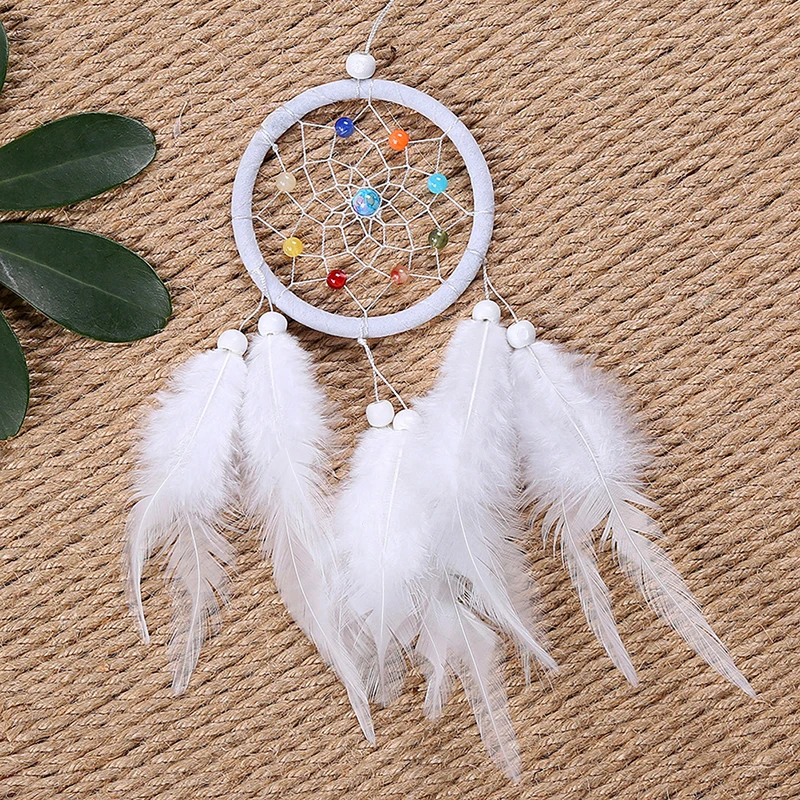 1pc Handcrafted dream catcher featuring rattan beads and feathers, perfect for wall decor and home ornamentation