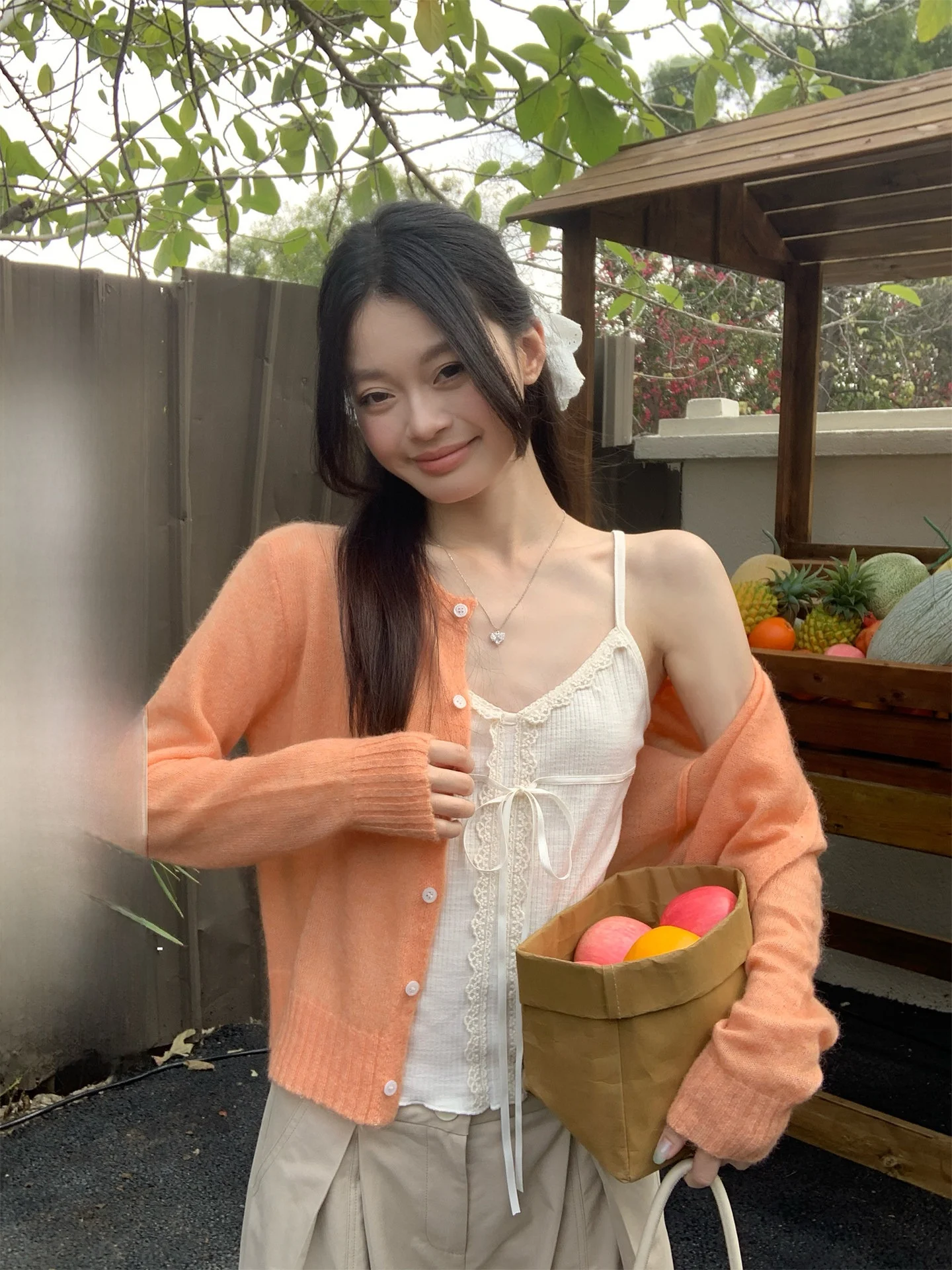 

Song Zhengen Light Orange Thin round Neck Knitted Open Cardigan Women's Loose Korean Style High-End Unique Beautiful Top