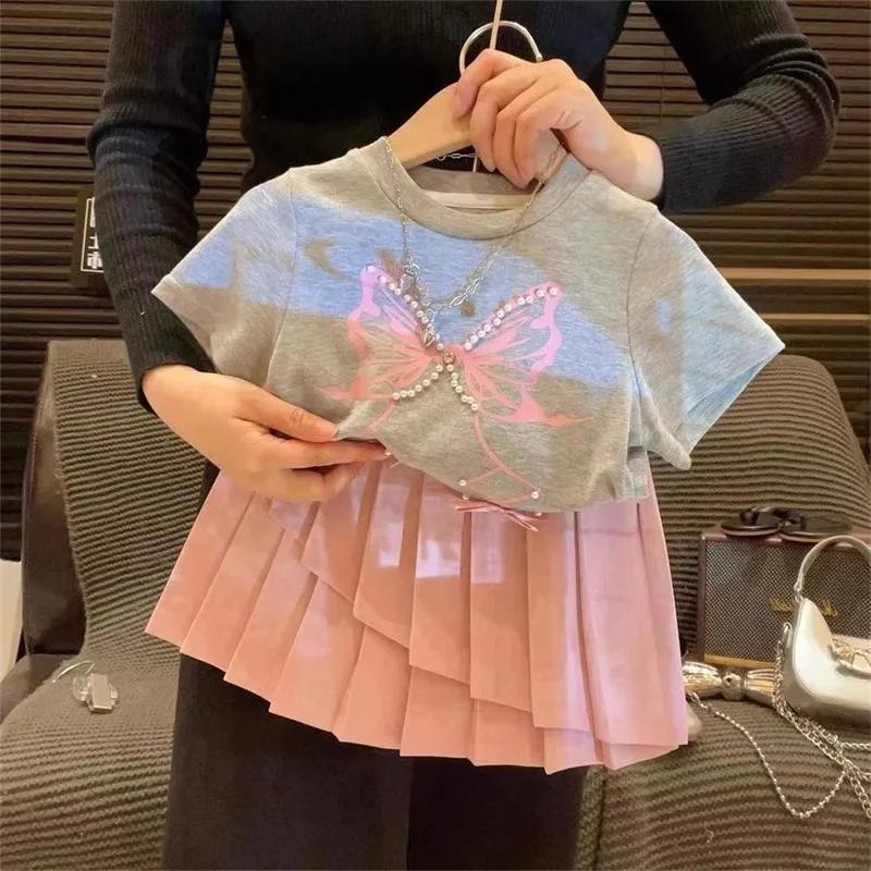 

2024 Korean Version of The Girl's Sweet Suit Summer Little Girl Pearl Bow Short-sleeved T-shirt Pleated Skirt Two-piece Set