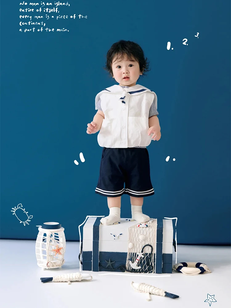 nautical-theme-1-year-old-baby-photography-props-set-cute-sailor-costume-swim-ring-wooden-fish-toys-for-studio-ocean-scene-props