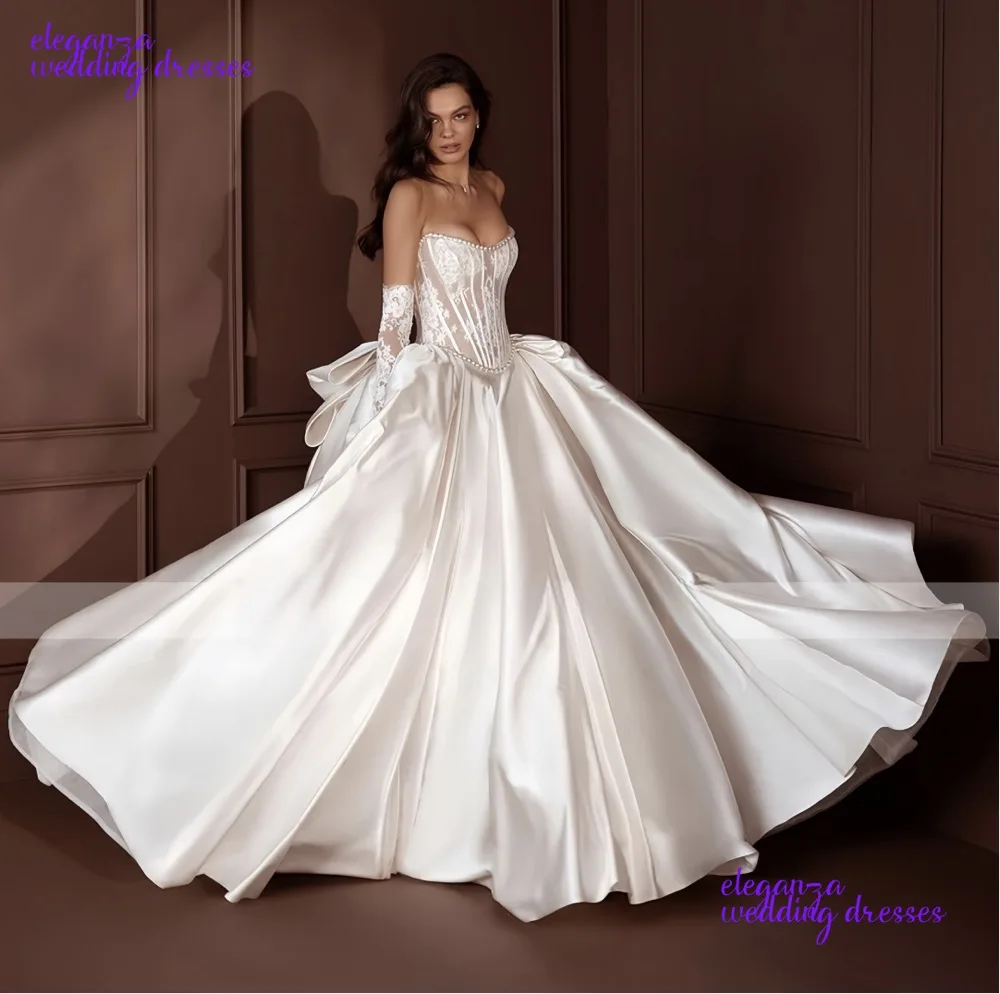 تخصيص رائع بدون حمالات الكرة ثوب الساتان فستان الزفاف خمر لؤلؤ سباركلي الديكور الدانتيل المرأة زي العرائس مع القوس 2025