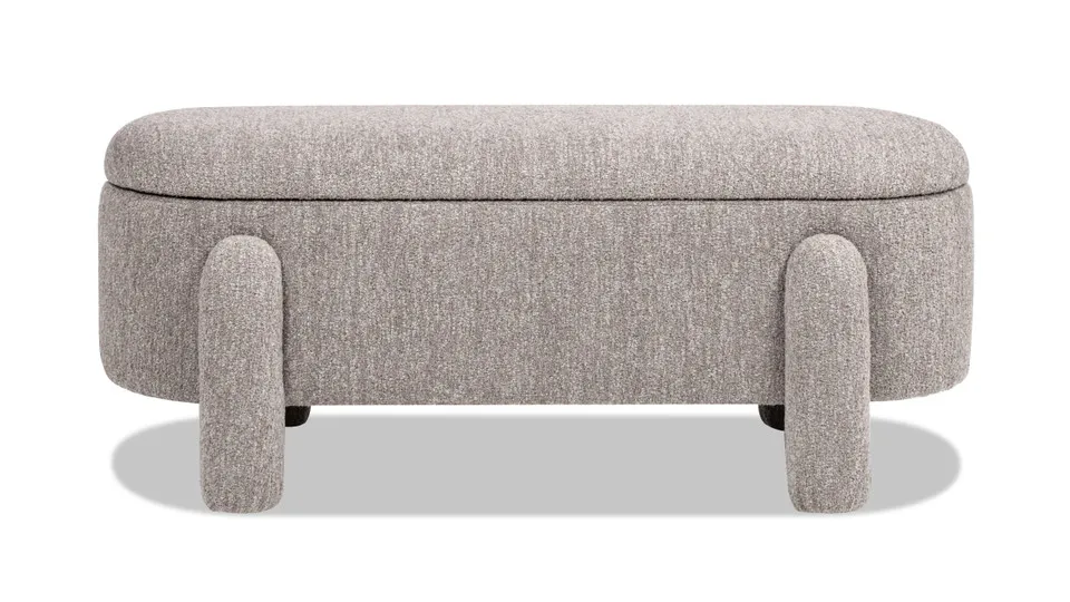 

Oval fully cushioned storage bench with spotted beige fur circles