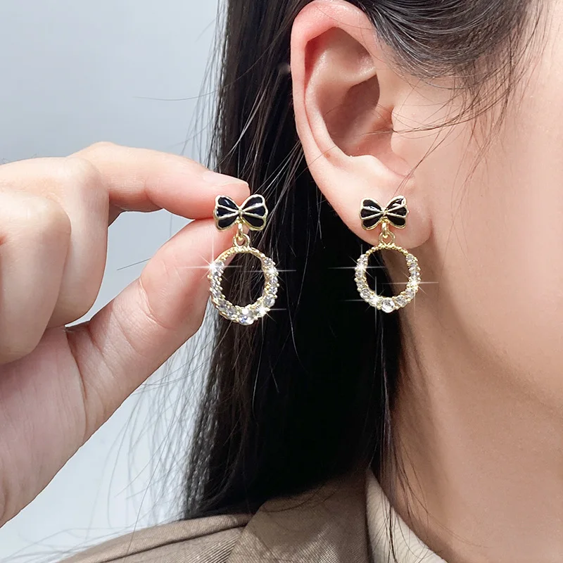 New Design High QualityLight Luxury Style Sweet Bow High-end Feeling Niche Personality Long Tassel Earrings for Women Jewelry.