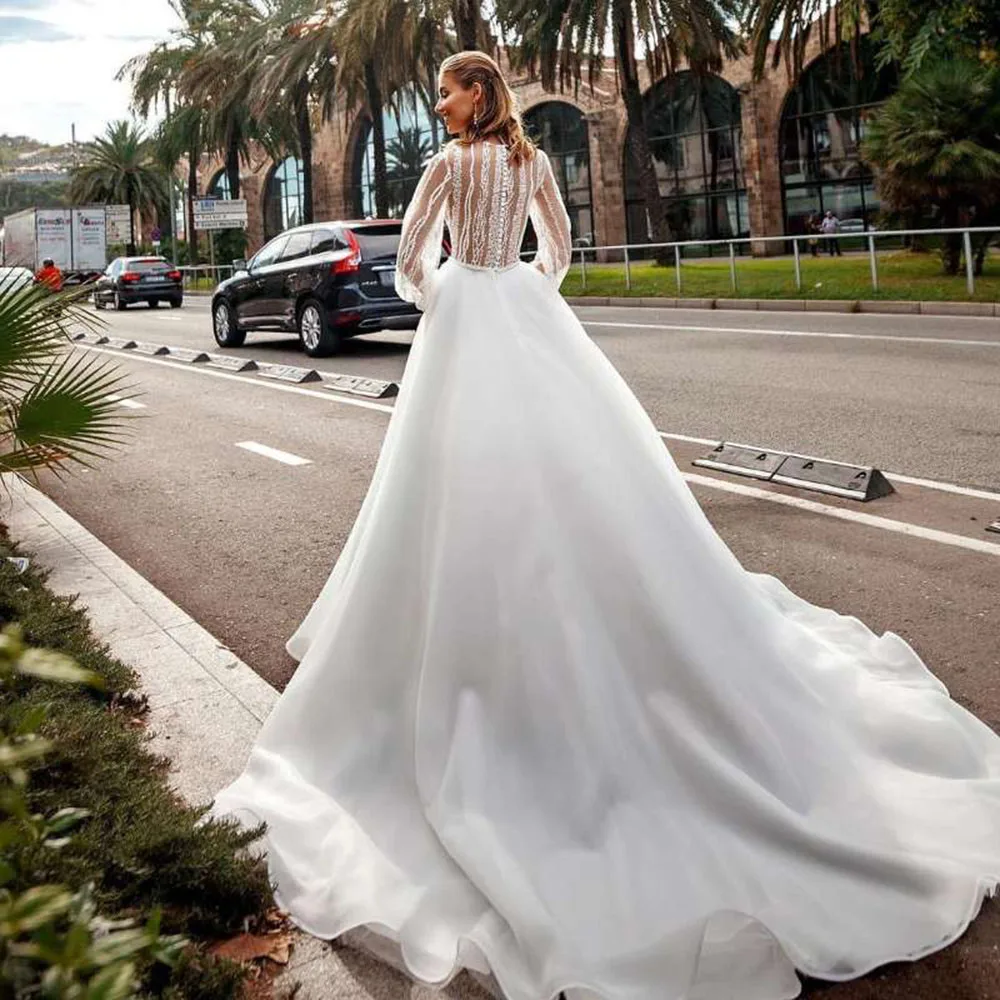 SoDigne-vestidos de novia de princesa moderna, sin mangas con traje largo cuello en V, ilusión de Organza, talla grande