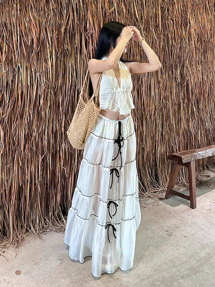 

Clothland Women Sexy White Suit V Neck Lace Up Short Style Crop Top Long Skirts Slim Female Fashion Two Piece Set TA684