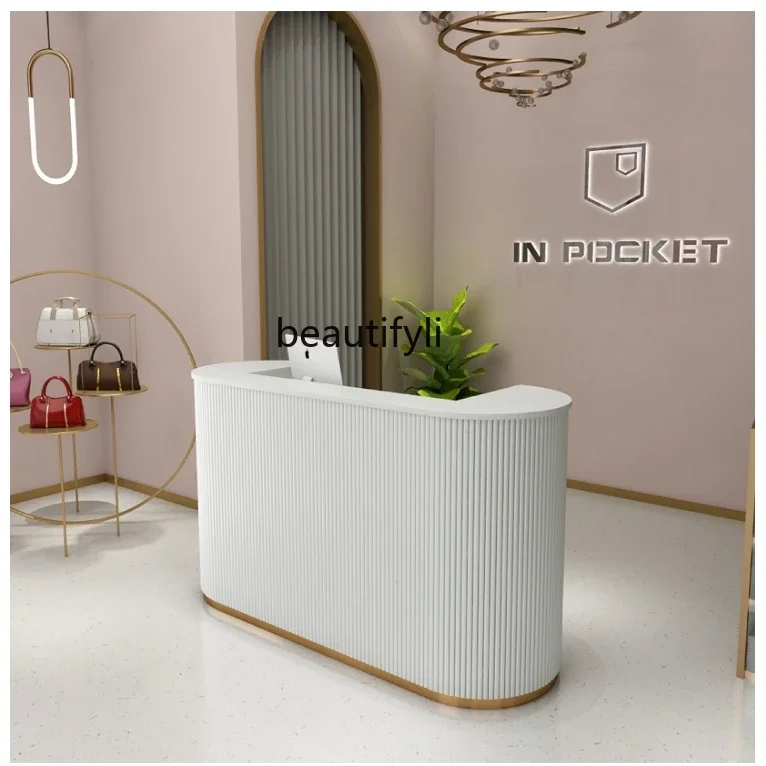 Modern simple clothing store curved checkout page beauty salon bar light luxury studio reception desk