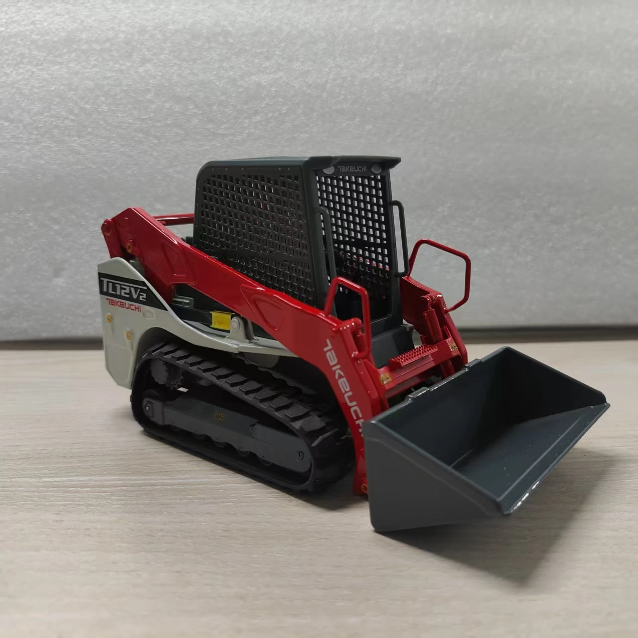 يموت الصب 1:25 مقياس Takeuchi TL12V-2 محمل زلق الهندسة رافعة شوكية ثابتة محاكاة سبيكة نموذج جمع هواية تذكارية #2
