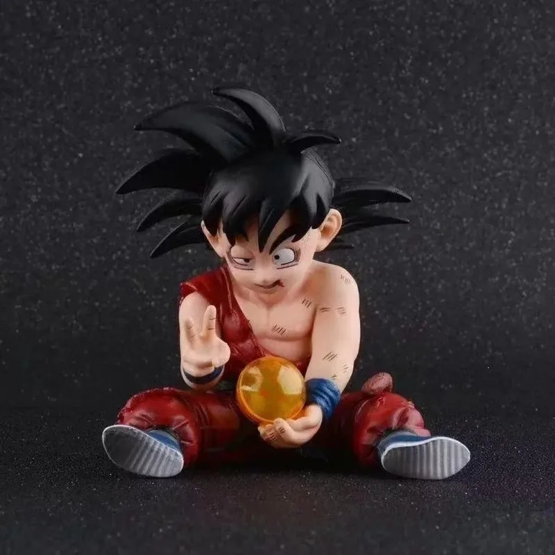 Figurine Dragon Ball Son Goku endommagée par la bataille, pose assise, tenant la Balle du Dragon, modèle PVC, objet de collection, décoration anime pour les fans adultes