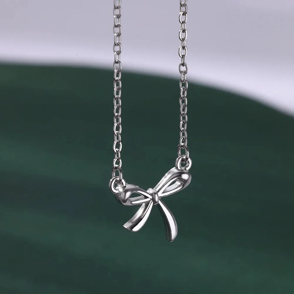 Naszyjnik ze stali nierdzewnej Bowknot Lucky dla kobiet Koreańskie naszyjniki w kolorze złotym Kobieca estetyczna biżuteria Choker Codzienne akcesoria — zdjęcie 6