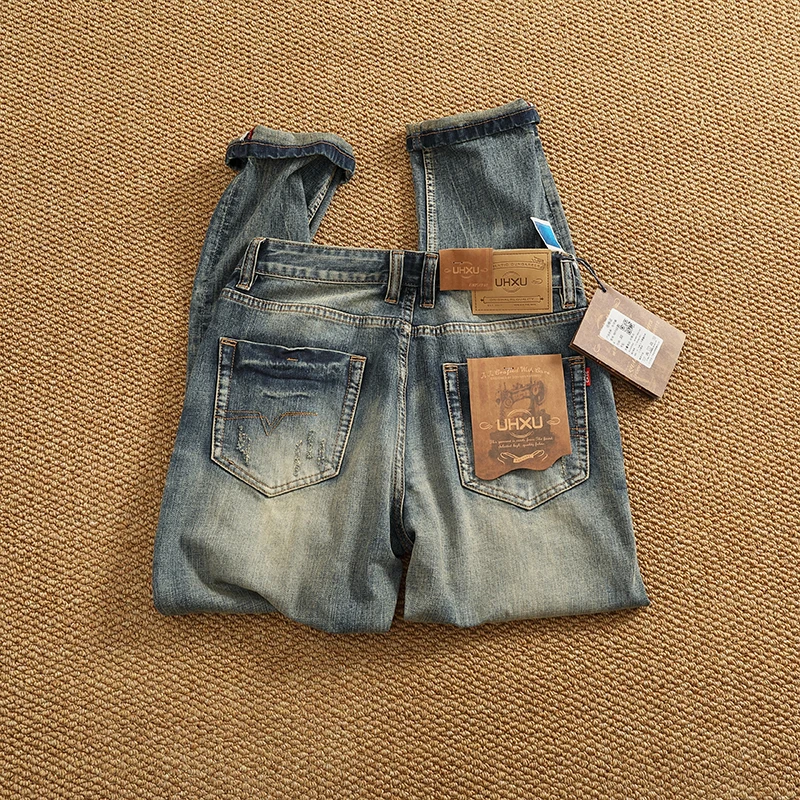 بنطلون جينز رجالي ثقيل الوزن بأرجل مستقيمة باللون الأبيض من قماش الدنيم المطاطي بنطلون طويل جينز صيفي عصري غير رسمي