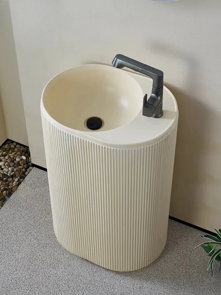 

Garden outdoor art integrated floor-to-ceiling wash basin cream wind villa column wash basin oval