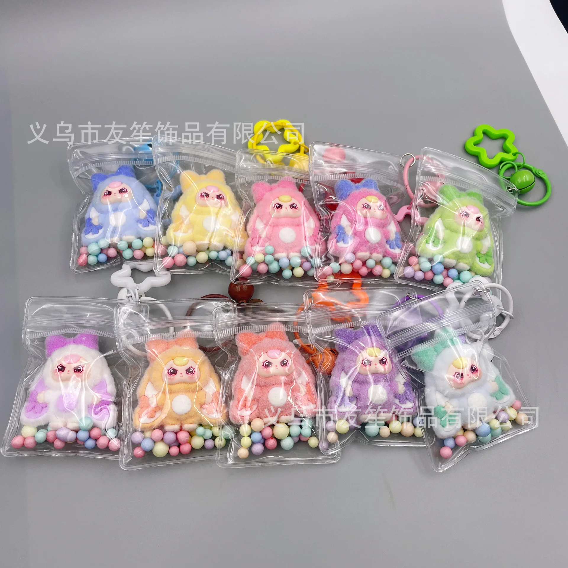 

New style three-spoke transparent bag pendant, cartoon cute ball keychain, bag hanger, decorative item, trendy toy accessory