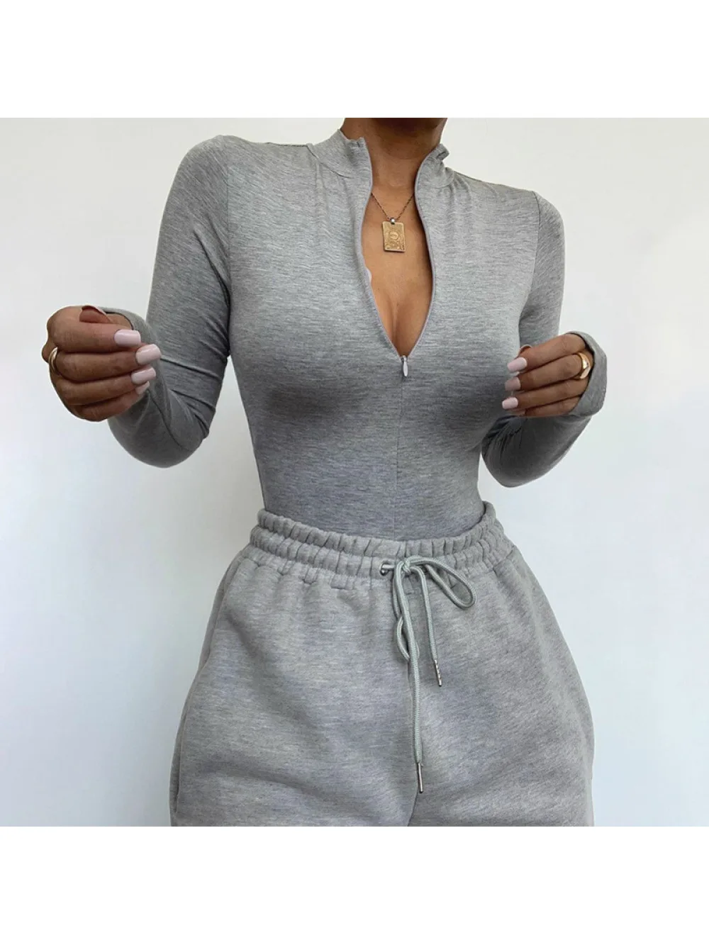 

Spring, summer, autumn and winter new solid color base shirt long sleeved zipper tight fitting outer jumpsuit