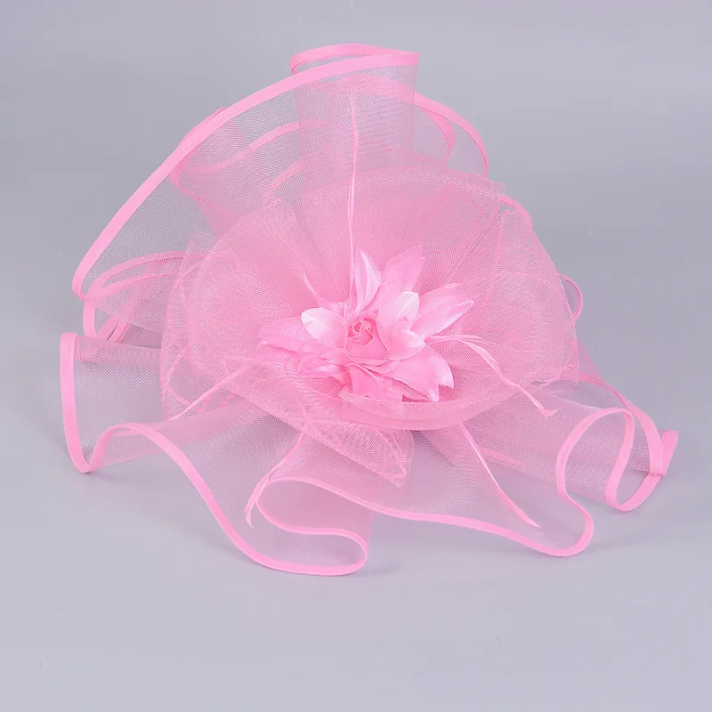 Exaggerated wedding pink mesh hair accessories horse racing-themed headpieces vintage feather and flower head ornaments runway