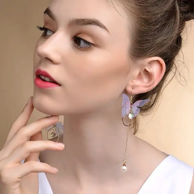 

Korea retro asymmetrical exquisite butterfly imitation pearl alloy long wings earrings for women's best gift earrings 2021 trend