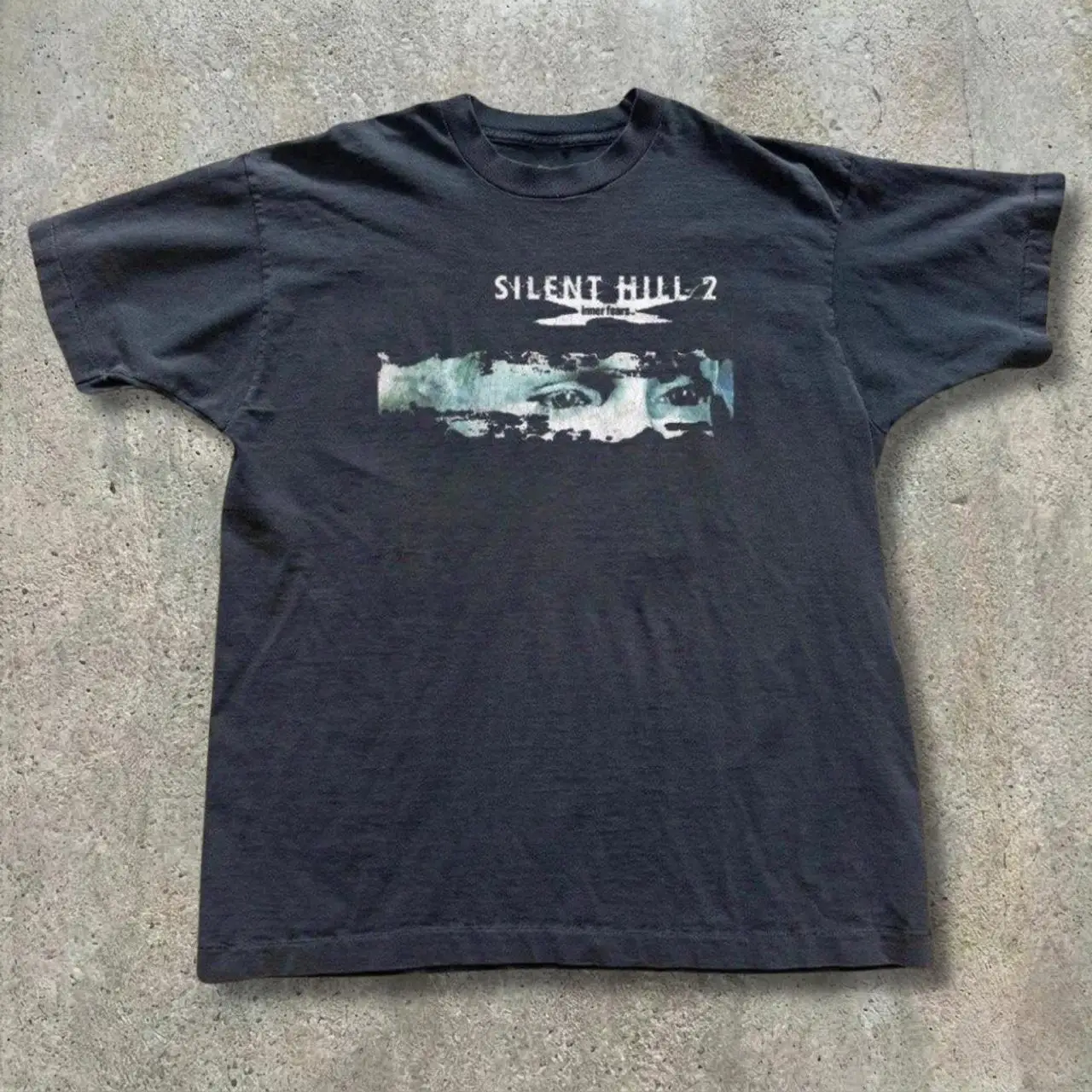 Black Silent Hill 2 T-shirt with Graphic of A Face with Eyes Horror Gaming Unisex Graphictee