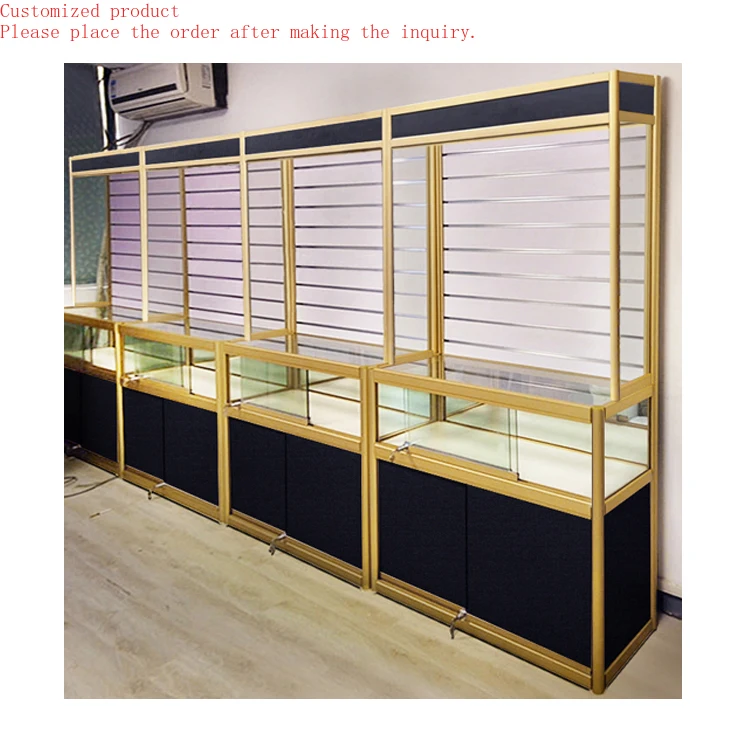 

Custom.78'' Tall Golden Frame Black Panel L-shaped Lockable Slatwall Back Glass Display Cabinet for Displaying Small Products