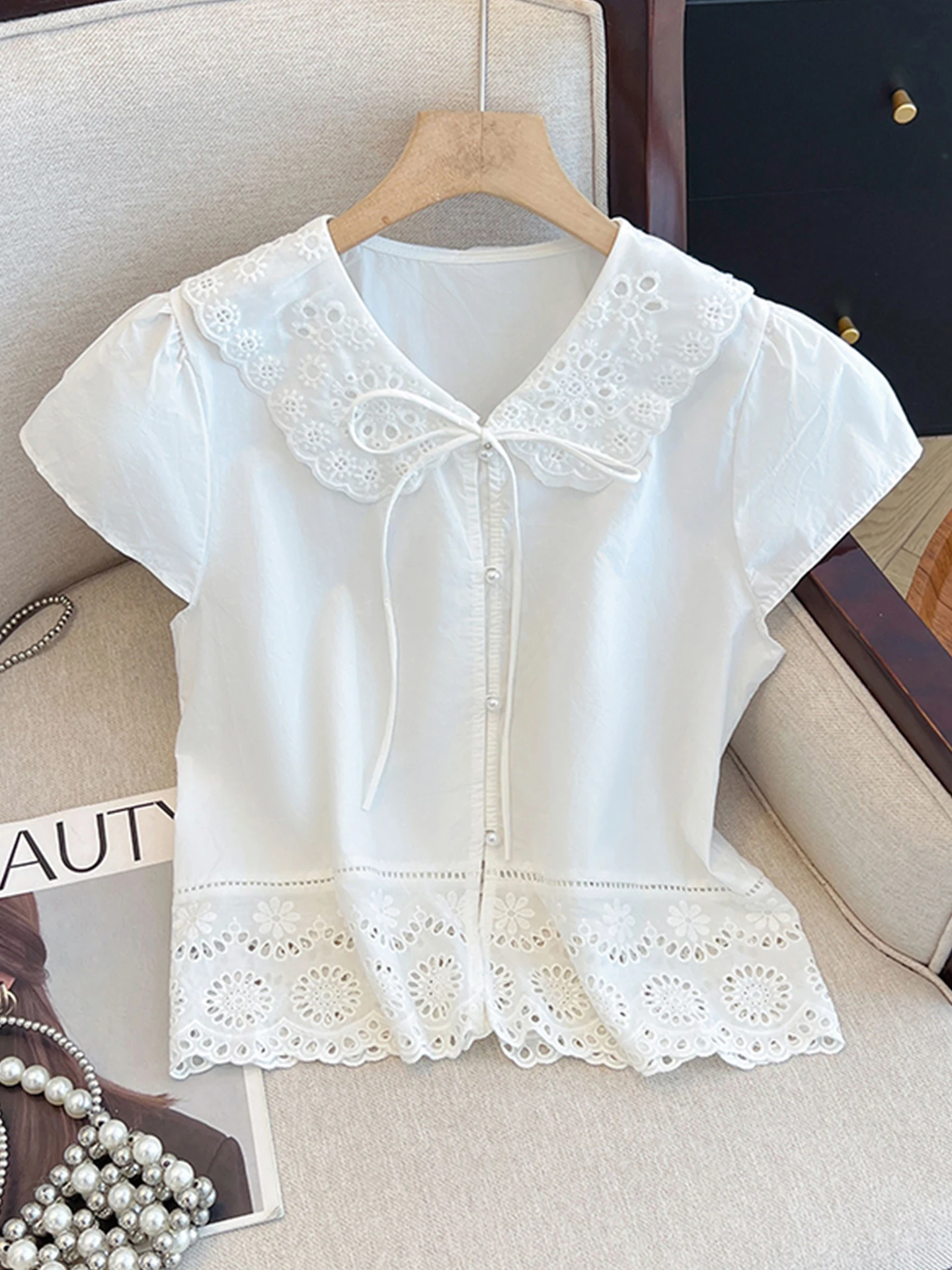 

Sweet Sle Embroidered Hollow out Doll Collar Fly Sve irt Women's Faion Spring 2026 New Design Knot Top