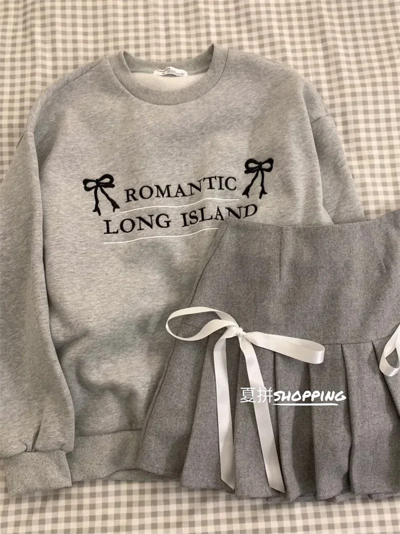 Embroidered letters loose long-sleeved sweater women slim high waist bow pleated skirt casual two-piece Korean girlish feeling
