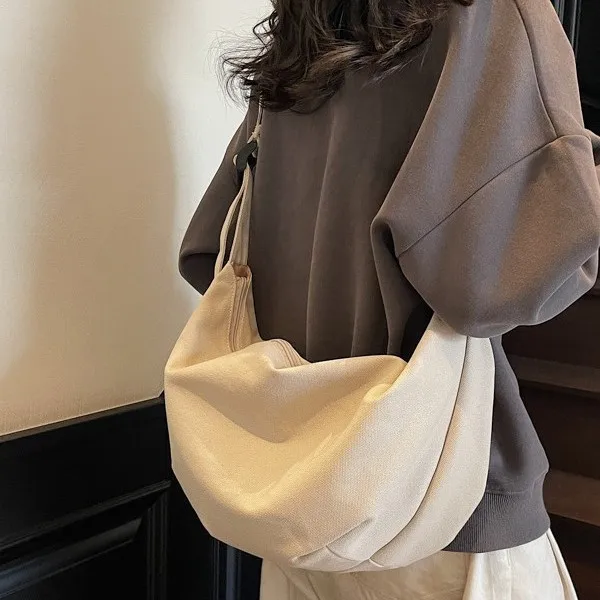 

Canvas Bag Women's Large Capacity 2025 New Versatile Lazy Wind Shoulder Messenger Bag Casual Commuter Dumpling Bag