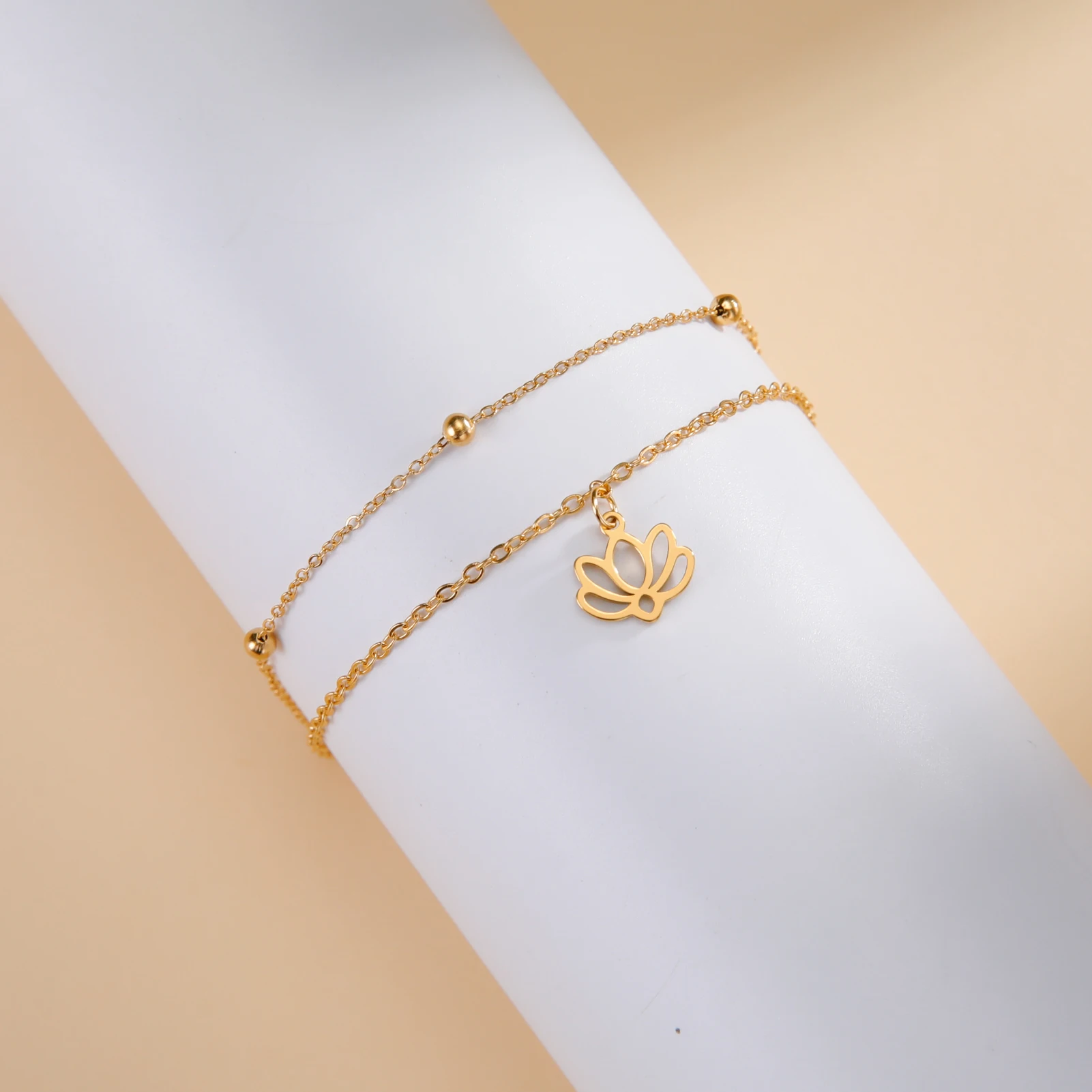 Kkjoy Mode Klassische Edelstahl Hohl Kleine Lotus Blume Armband Fußkettchen Für Frauen Trend Schmuck Party Geschenk Großhandel – Detail 8