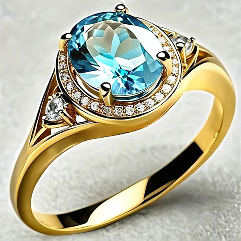 Huitan Goldfarbene ovale himmelblaue Zirkonia-Ringe für Damen, für Hochzeit, Verlobung, elegante Damenringe, Party, Modeschmuck, neu