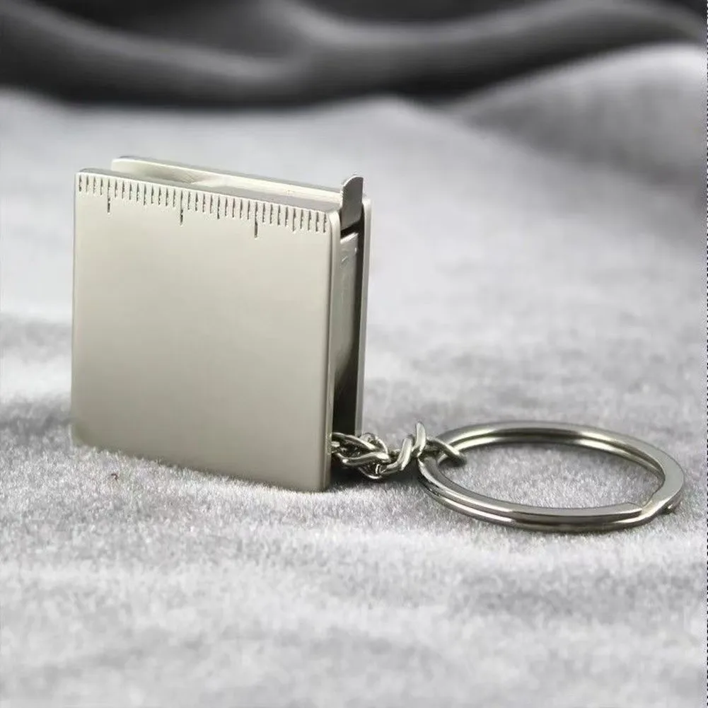 Keychain-Mounted Zinc Alloy Tape Measure 47.24 Inches with Clear Dual Scale Markings for Reliable Field Measurements