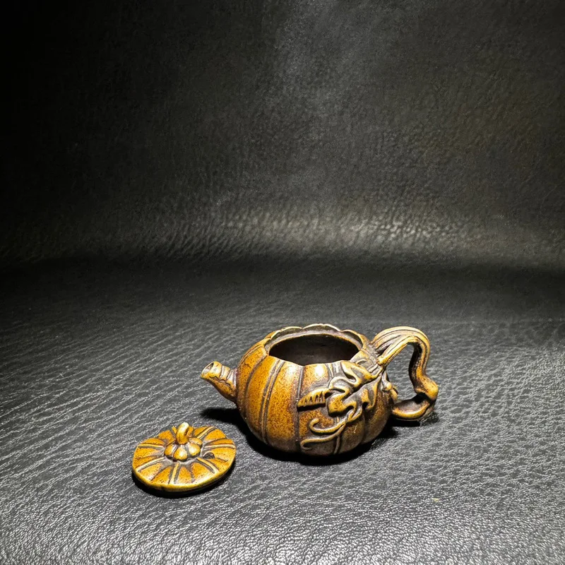 Antique-style mini copper teapot with pumpkin-shaped handle and water drop design