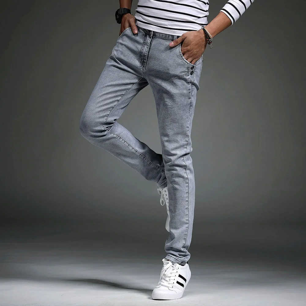 กางเกงยีนส์ผู้ชายสไตล์เกาหลีรุ่นใหม่ ทรงสลิม ยืดหยุ่น ทรงดินสอขายาว ใส่สบาย ทรงหลวม สำหรับผู้ใหญ่