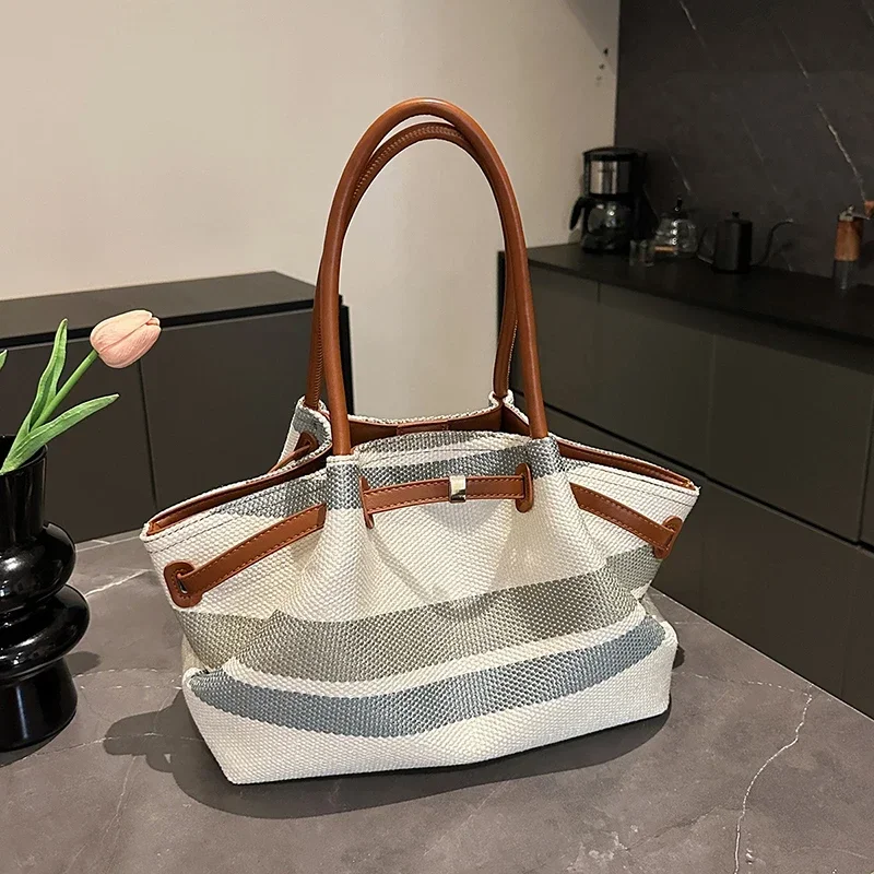 

Simple Casual Fashion Sense of Luxury Canvas Shoulder Bags Solid Striped High Quality Commute Style Tote Bags for Women 2025 New