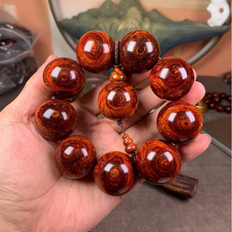 

Old Huanghuali bracelet with 30 large beads, burl , double-sided spider pattern, natural eye, solid wood, handmade